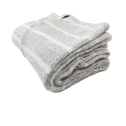 Folded gray leg warmer on a white background