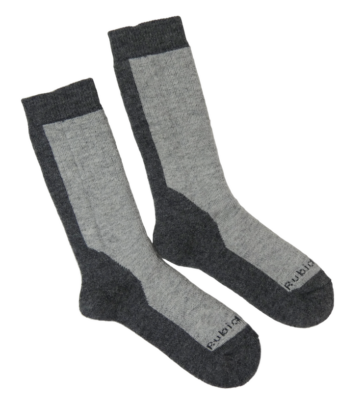 Pair of gray socks with black accents on a light gray background