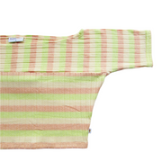 Striped shirt with orange and green pattern on a light white background